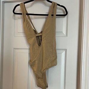 BECCA Gold Women's One Piece Swimsuit